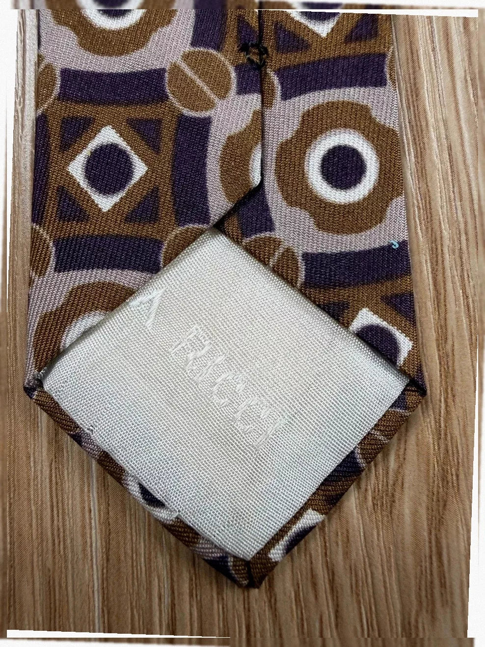 Cravate Nina Ricci soie motifs géométriques vintage années 90