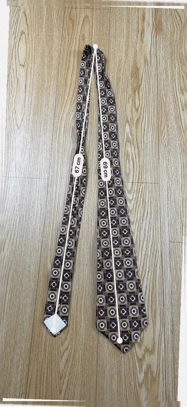 Cravate Nina Ricci soie motifs géométriques vintage années 90