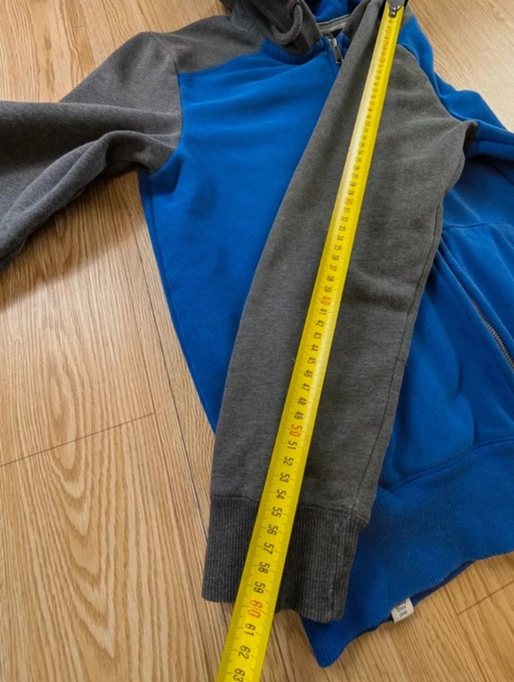 Veste zippée Puma bicolore bleu gris capuche intérieur L